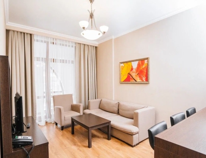 Апартаменты Стандарт 2-местные  1 спальня с зоной гостиная/кухня +540 - Апартаменты Курорта Красная Поляна