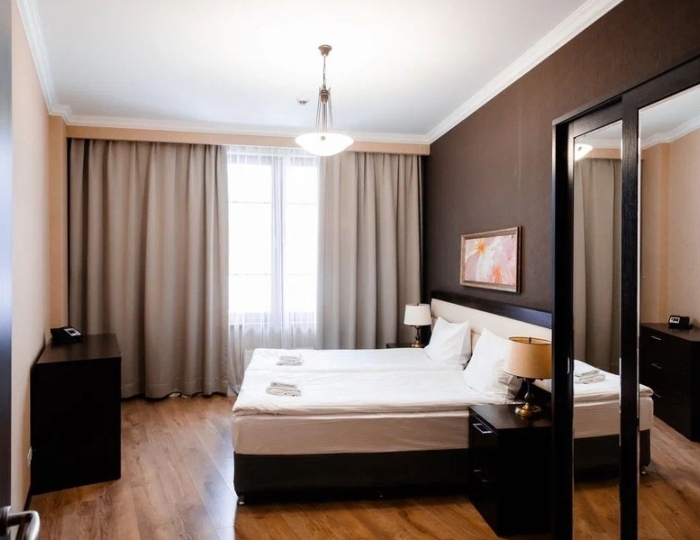 Апартаменты Стандарт 2-местные  1 спальня с зоной гостиная/кухня +540 - Апартаменты Курорта Красная Поляна